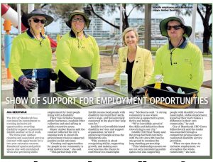 “Three Intelife employees in high-visibility uniforms stand with Mandurah Mayor Amber Kearns at a public outdoor area, highlighting support for inclusive employment opportunities and community partnerships.”
